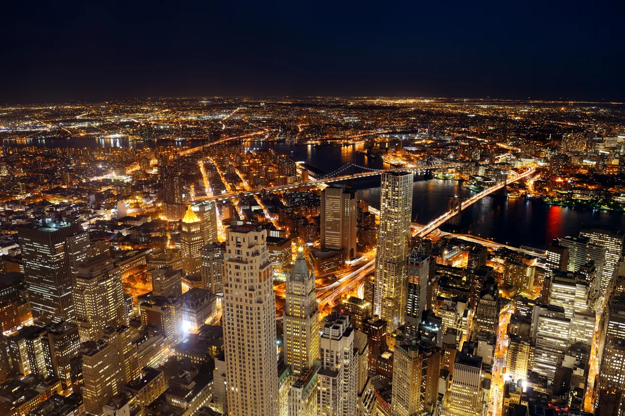New York skyline at night, editorial international market imagery